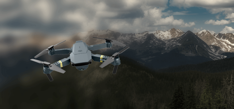 Image of Black Falcon Drone flying in front of mountain tops